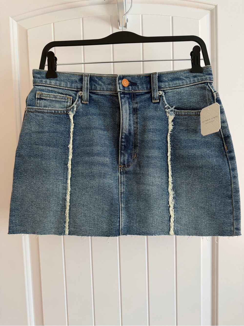 Altar'd State Distressed Vertical Seam Denim Mini Skirt in Medium Blue